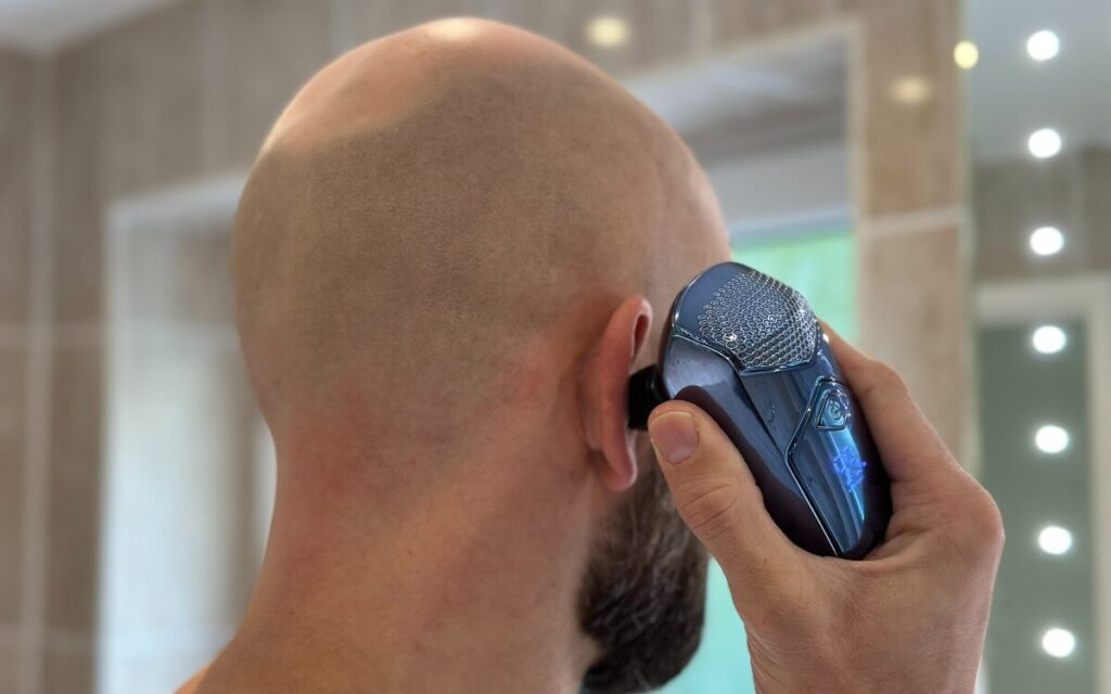 Using the ear trimmer attachment on the Kibiy head shaver
